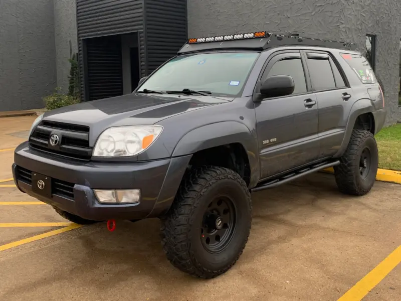 Cali Raised Bolt-On Rock Sliders For 2003–2009 Toyota 4Runner Trail Edition – Raw Steel Kick-Out Design 1
